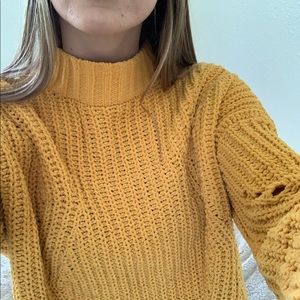 yellow sweater